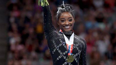 Simone Biles makes US gymnastics history by winning record 8th all-around title