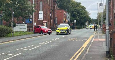 BREAKING: Road closed following major smash involving police car in Oldham - updates - manchestereveningnews.co.uk - county Oldham