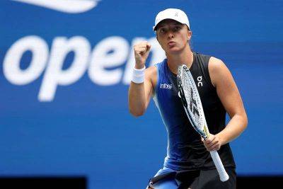 Defending champion Iga Swiatek crushes Rebecca Peterson in US Open first round