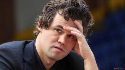 Chess-Carlsen and Niemann settle dispute over cheating claims
