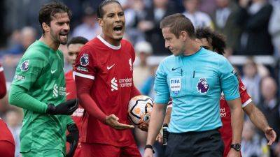Virgil Van Dijk charged with 'acting in improper manner' after Newcastle red