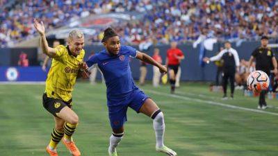 Chelsea's Nkunku injures knee, Pochettino refuses to blame pitch