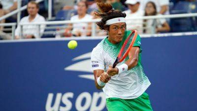 China's Zhizhen Zhang ousts No. 5 Casper Ruud from US Open - ESPN