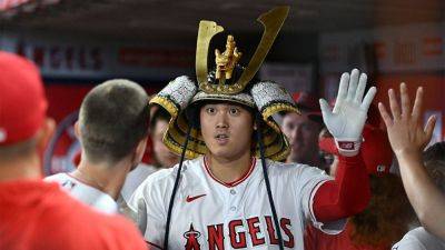 Angels’ Shohei Ohtani exits mound with cramps, still hits MLB-best 40th home run