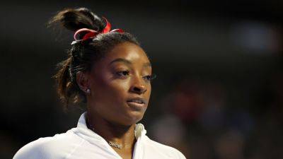 Simone Biles returns to gymnastics with signature move - ESPN