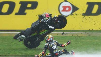 Marc Marquez - Alex Marquez - Fabio Quartararo - Francesco Bagnaia - Marco Bezzecchi - Bezzecchi on pole despite crashing at wet British GP - channelnewsasia.com - Britain - Netherlands - Italy