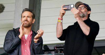 Hugh Jackman watches Wrexham game with Ryan Reynolds and Rob McElhenney