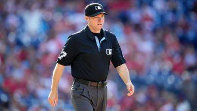 Umpire in Nationals-Phillies game has three calls overturned - ESPN