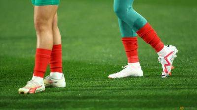 Sportswear brands seek retail space for their women's boots - channelnewsasia.com - Britain