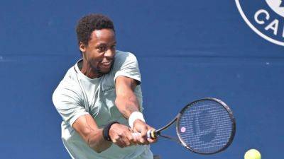 Monfils stuns Tsitsipas, joins Medvedev and Raonic in third round