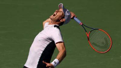 Murray admits grand slam runs may be over after exit as Isner calls time on singles career