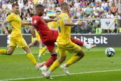 Unlikely hero Kyle Walker salvages a point for England against Ukraine