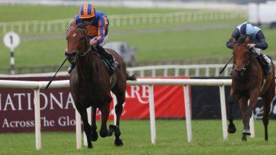 Aidan Obrien - Ryan Moore - Milestone moment for Aidan O'Brien as Henry Longfellow wins the Vincent O'Brien National Stakes - rte.ie - Poland - Ireland - county Murray - Cuba
