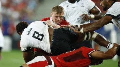 Wales weather Fiji storm to edge World Cup classic 32-26