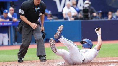 Blue Jays capitalize on 3 Royals wild pitches in come back victory