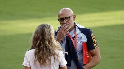Spain's men's coach sticks to football amid kiss furore