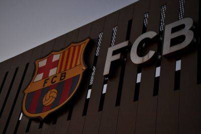 Barcelona hit by Liga spending limit cut