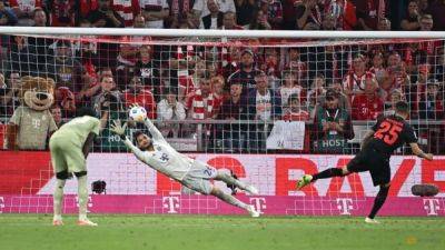 Leverkusen snatch 2-2 draw at Bayern with stoppage-time penalty