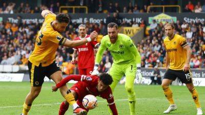 Harvey Elliott - Andy Robertson - Cody Gakpo - Pedro Neto - Liverpool go top of the league with 3-1 win at Wolves - channelnewsasia.com