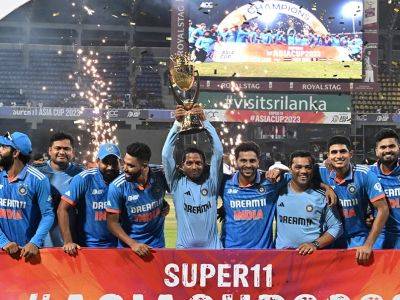 Virat Kohli - Rohit Sharma - Sachin Tendulkar - Mohammed Siraj - Not Indian Cricket Team Player, Coach Or Physio - Who's The Man Who Lifted Asia Cup Trophy? Find Here - sports.ndtv.com - India - Sri Lanka