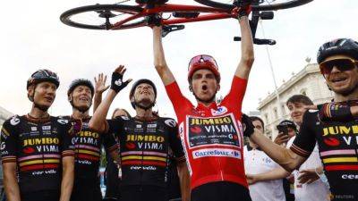 Kuss celebrates Vuelta triumph, Groves wins in Madrid