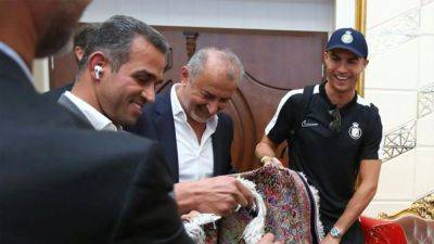 Cristiano Ronaldo - Star - Iranians give Ronaldo rapturous welcome in Tehran - channelnewsasia.com - Britain - Portugal - China - Iran - Saudi Arabia - Instagram