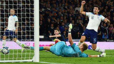 Kane defends 'scapegoated' defender Maguire