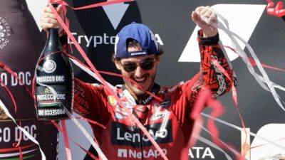 Bagnaia breaks lap record to claim Catalunya GP pole