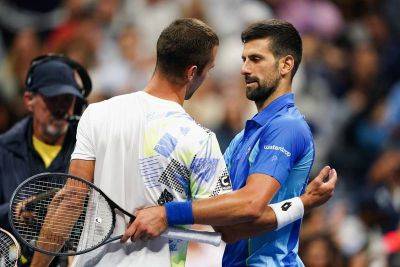 Relieved Djokovic survives major US Open scare to progress in five sets