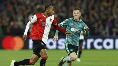 Feyenoord beat nine-man Celtic 2-0