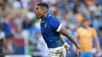 Tale of two halves as ill-disciplined Italy beat Uruguay at World Cup