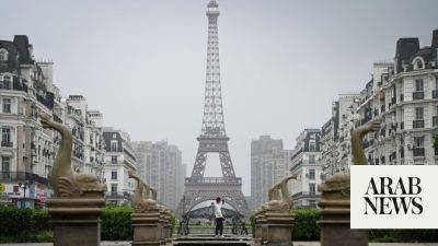 ’Eiffel Tower’ lights up quiet suburb in Chinese city of Asiad host Hangzhou