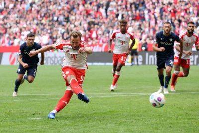Record-breaker Harry Kane hits hat-trick as Bayern Munich batter Bochum in Bundesliga