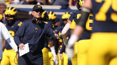 Jim Harbaugh - Michigan overcomes slow start to defeat Rutgers in Jim Harbaugh's return from 3-game suspension - foxnews.com - Usa - state Michigan