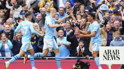Ten-man Man City show silk and steel to extend Premier League lead