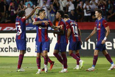 Robert Lewandowski - Rafa Benitez - Joao Cancelo - Royal Antwerp - Xavi hails Barcelona's 'winning character' after thrilling fightback victory over Celta - thenationalnews.com
