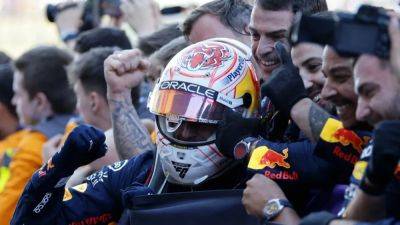 Verstappen victory secures team title for Red Bull