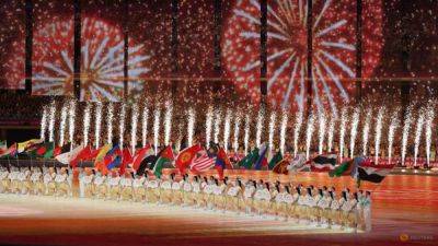 Xi Jinping - Thomas Bach - China's Xi opens Hangzhou Asian Games, ceremony dazzles - channelnewsasia.com - China - Afghanistan - Syria