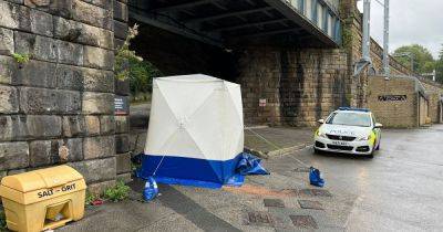 Tent in place and police seal off town centre street as man rushed to hospital with head injury - manchestereveningnews.co.uk