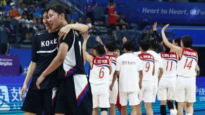 Games-Divided again, South Korea beat North Korea in Asian Games basketball