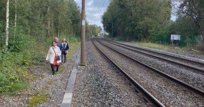 Moment passengers told to evacuate tram and walk along tracks after Metrolink incident - manchestereveningnews.co.uk