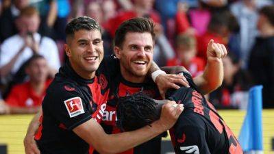 Alejandro Grimaldo - Jonas Hofmann - Record-breaking Leverkusen beat Mainz to go top in Bundesliga - channelnewsasia.com - Germany - county Bay