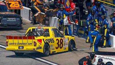 NASCAR crew member hit in the pits as driver spins out - foxnews.com - state Alabama - county Smith