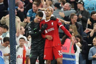 Matip's late own goal seals Spurs win over nine-man Liverpool