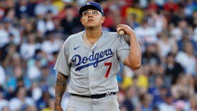 Dodgers P Julio Urías arrested on domestic violence charges - ESPN