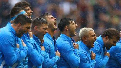 Italy already singing as they arrive for World Cup