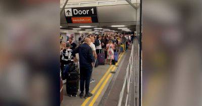 easyJet passengers slam 'absolute joke' as they battle HUGE Manchester Airport queue