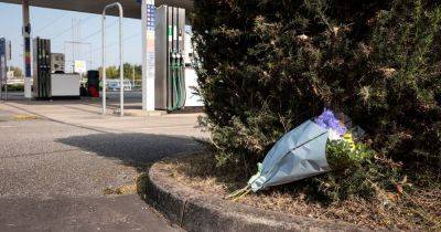 Tribute left outside petrol station where man 'set himself on fire' with forecourt taped off