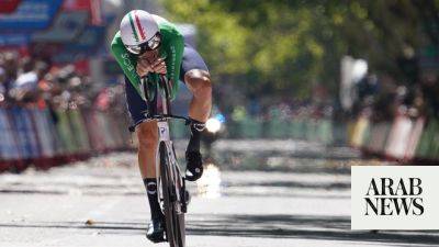 Ganna wins Vuelta time trial as Evenepoel hurts rivals