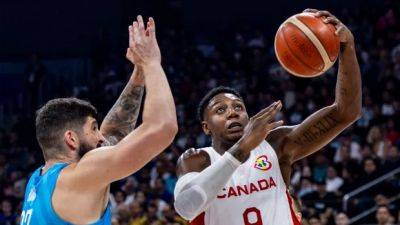 Canada takes aim at men's basketball World Cup medal after chippy win over Slovenia - cbc.ca - Germany - Serbia - Canada - Slovenia - Latvia - Lithuania